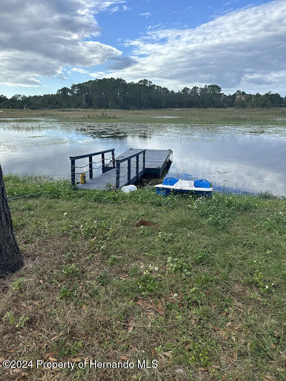 5555 Baffin Circle Spring Hill, FL 34606 - Photo 1 of 2 a view of a lake