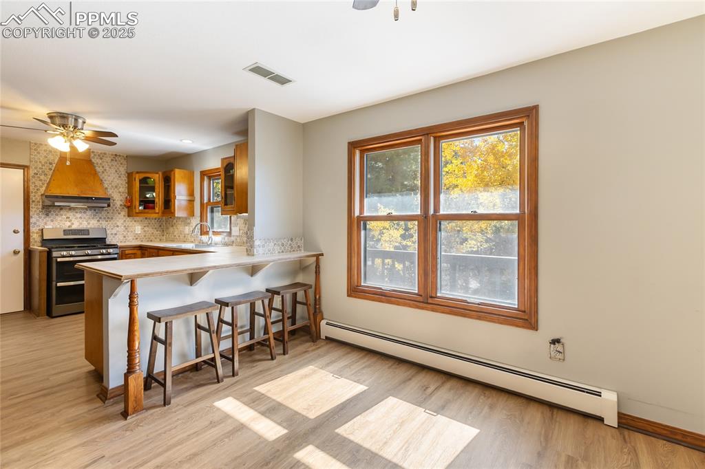 356 Spring Valley Drive Divide, CO 80814 - Photo 17 of 50 a large spacious bathroom with a large window and a sink