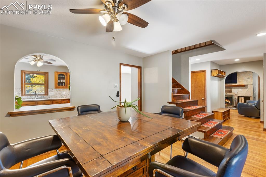 356 Spring Valley Drive Divide, CO 80814 - Photo 21 of 50 a view of a dining room with furniture window and wooden floor
