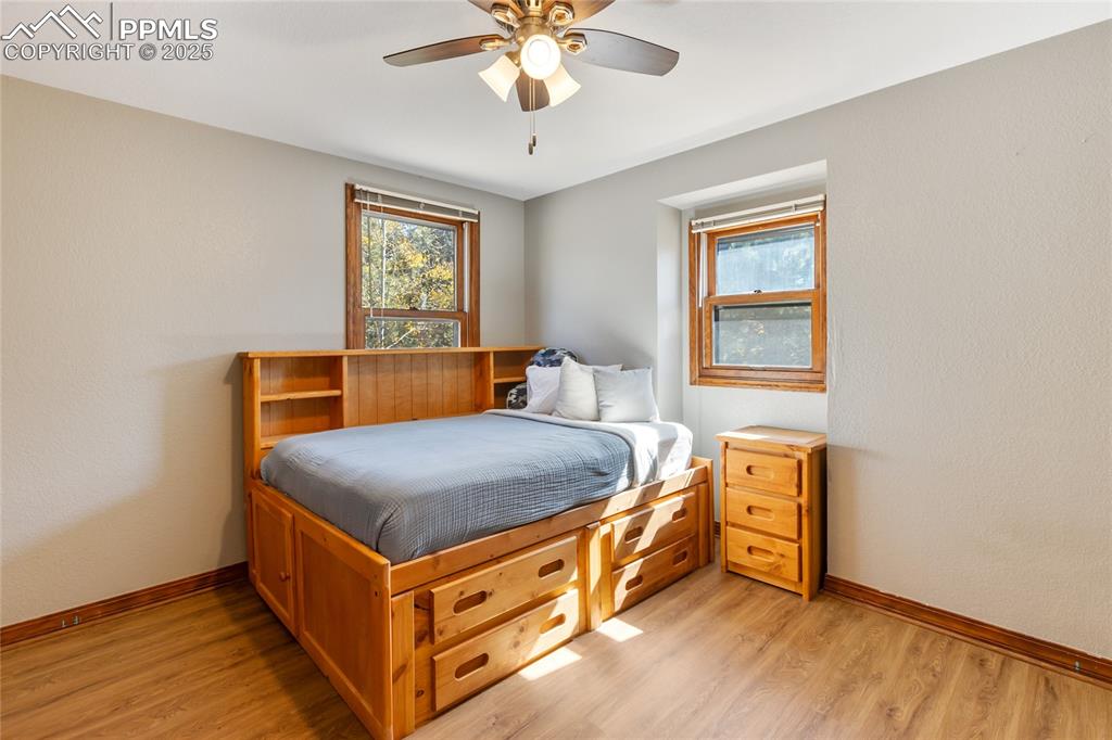 356 Spring Valley Drive Divide, CO 80814 - Photo 26 of 50 a bedroom with bed and window
