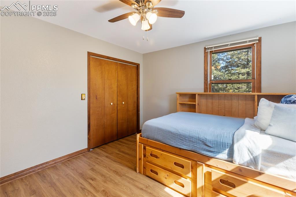 356 Spring Valley Drive Divide, CO 80814 - Photo 27 of 50 a bedroom with a bed and a window