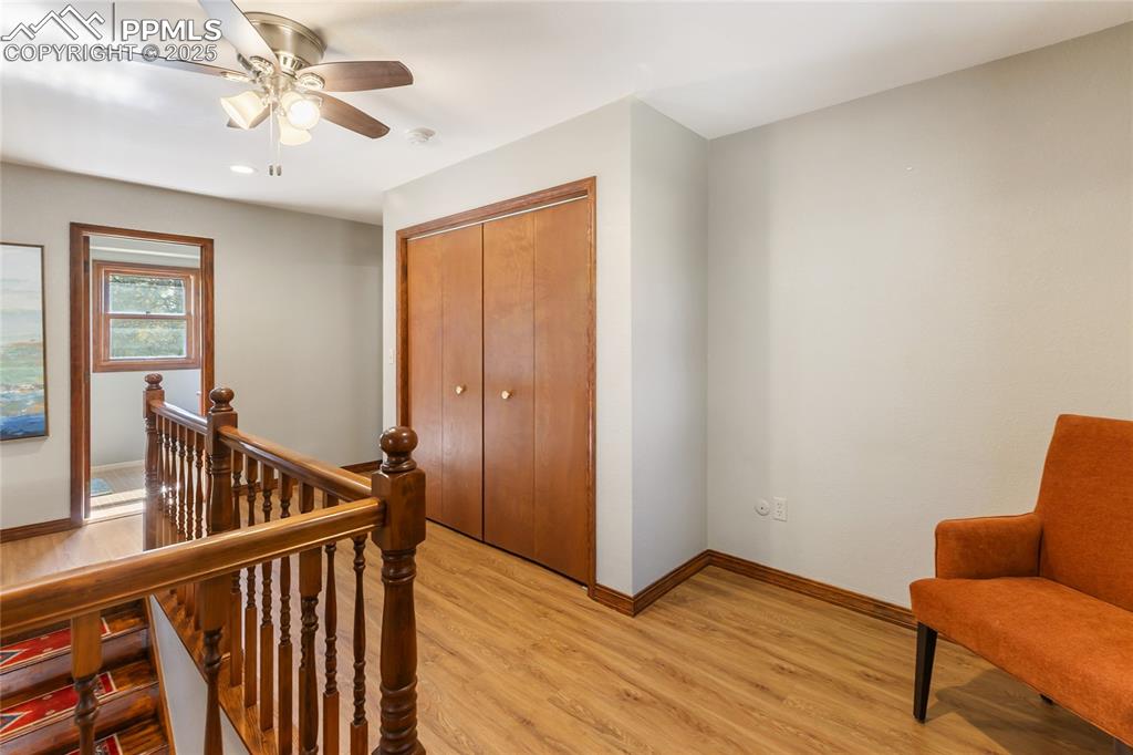 356 Spring Valley Drive Divide, CO 80814 - Photo 32 of 50 a view of room with hardwood floor and ceiling fan