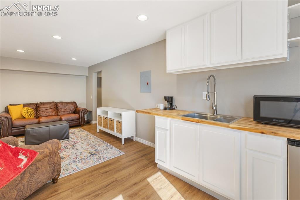 356 Spring Valley Drive Divide, CO 80814 - Photo 41 of 50 a living room with furniture and a wooden floor