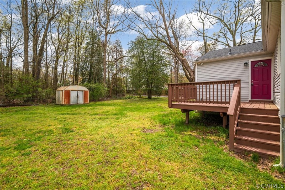 13900 Hackberry Road Chester, VA 23836 - Photo 39 of 41 a view of a chair and table in the garden