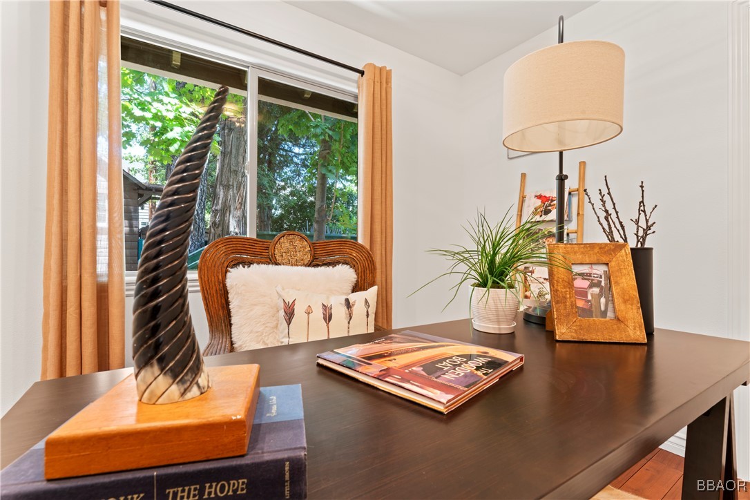 371 Maple Drive Lake Arrowhead, CA 92352 - Photo 22 of 50 a living room with furniture and a large window