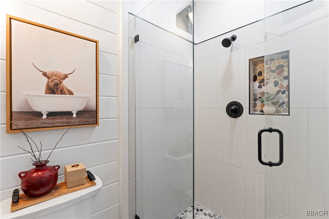 371 Maple Drive Lake Arrowhead, CA 92352 - Photo 44 of 50 a bathroom with a shower and a sink