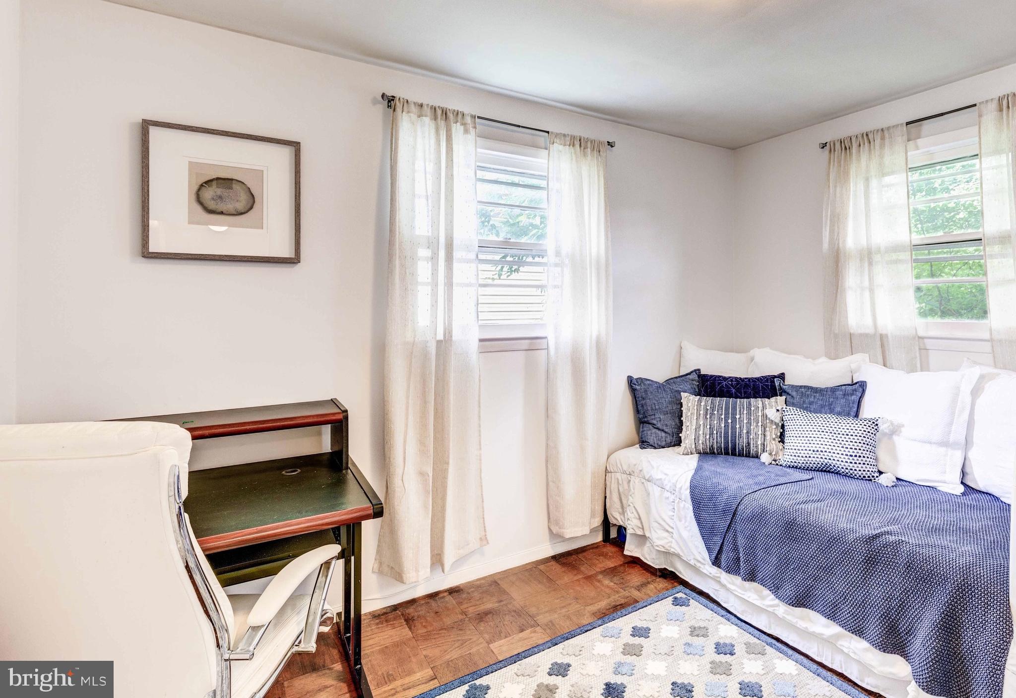 802 Templecliff Road Baltimore, MD 21208 - Photo 18 of 30 a bedroom with a bed and a window