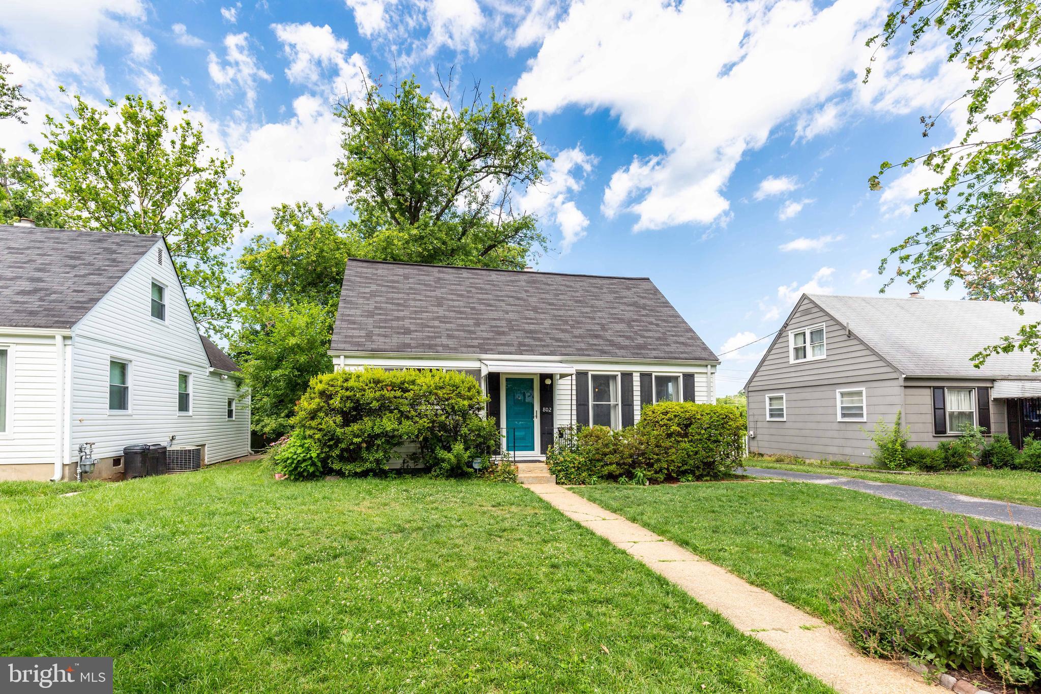802 Templecliff Road Baltimore, MD 21208 - Photo 3 of 30 a front view of house with yard and green space
