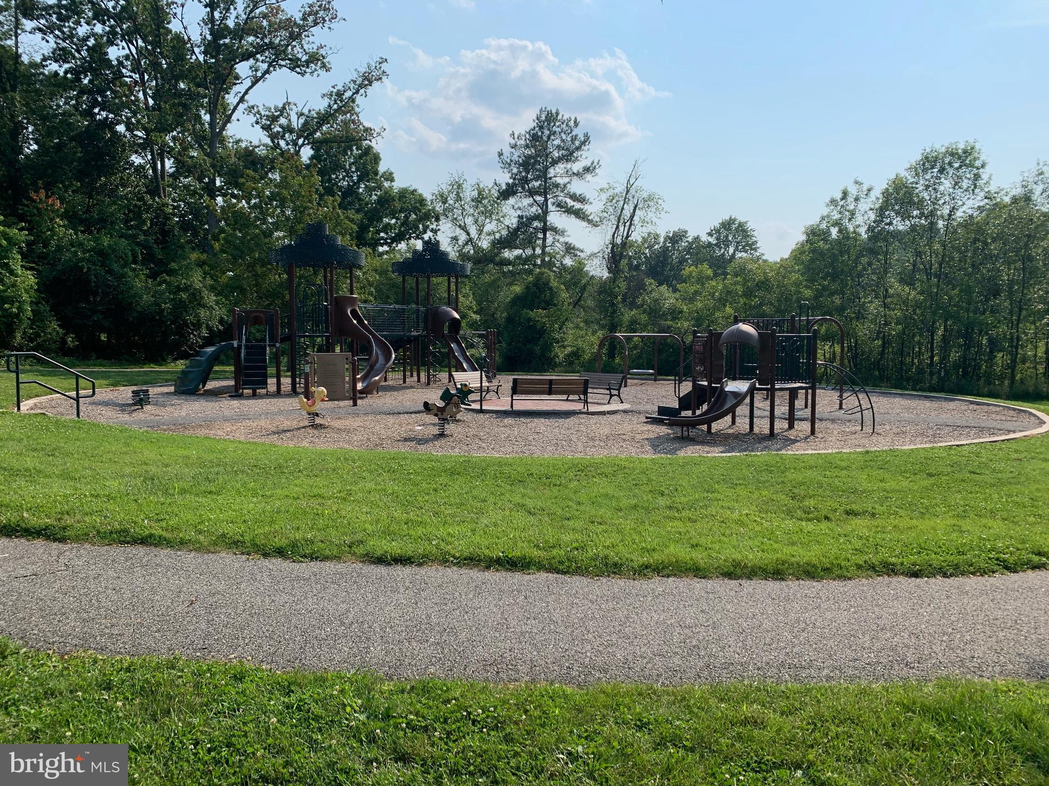 802 Templecliff Road Baltimore, MD 21208 - Photo 30 of 30 a view of a park with swings and slides