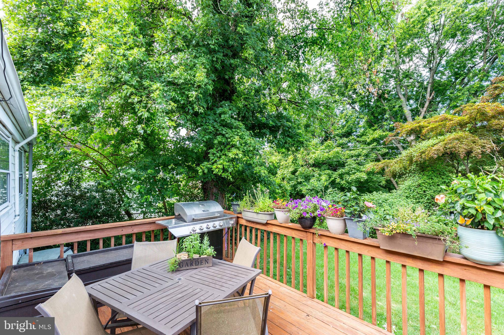 802 Templecliff Road Baltimore, MD 21208 - Photo 8 of 30 a view of a patio with wooden floor