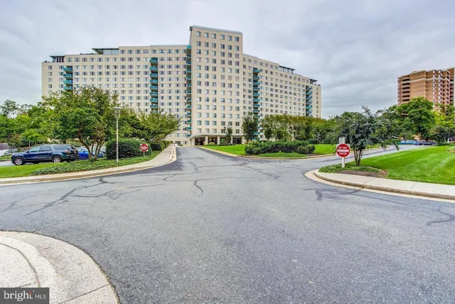 a view of a lobby with furniture and floor to ceiling window