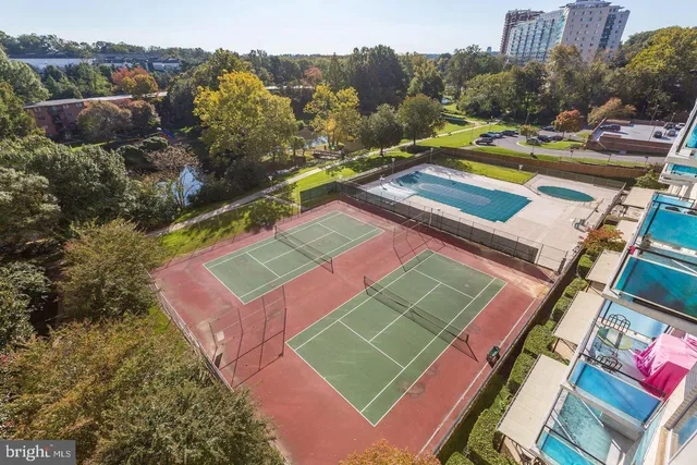 a view of a swimming pool with a patio