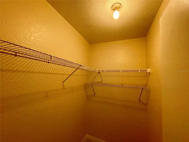 a bathroom with a sink toilet and mirror