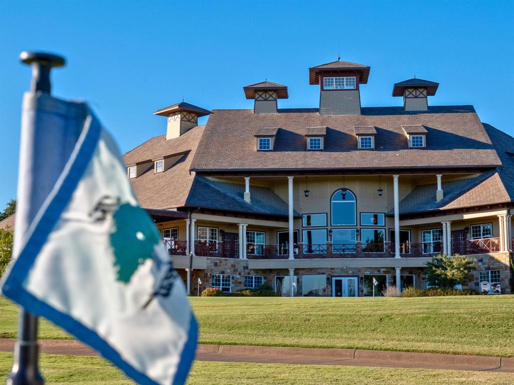 8400 Forest Lake Loop Cleburne, TX 76033 - Photo 3 of 12 a view of a building with a swimming pool