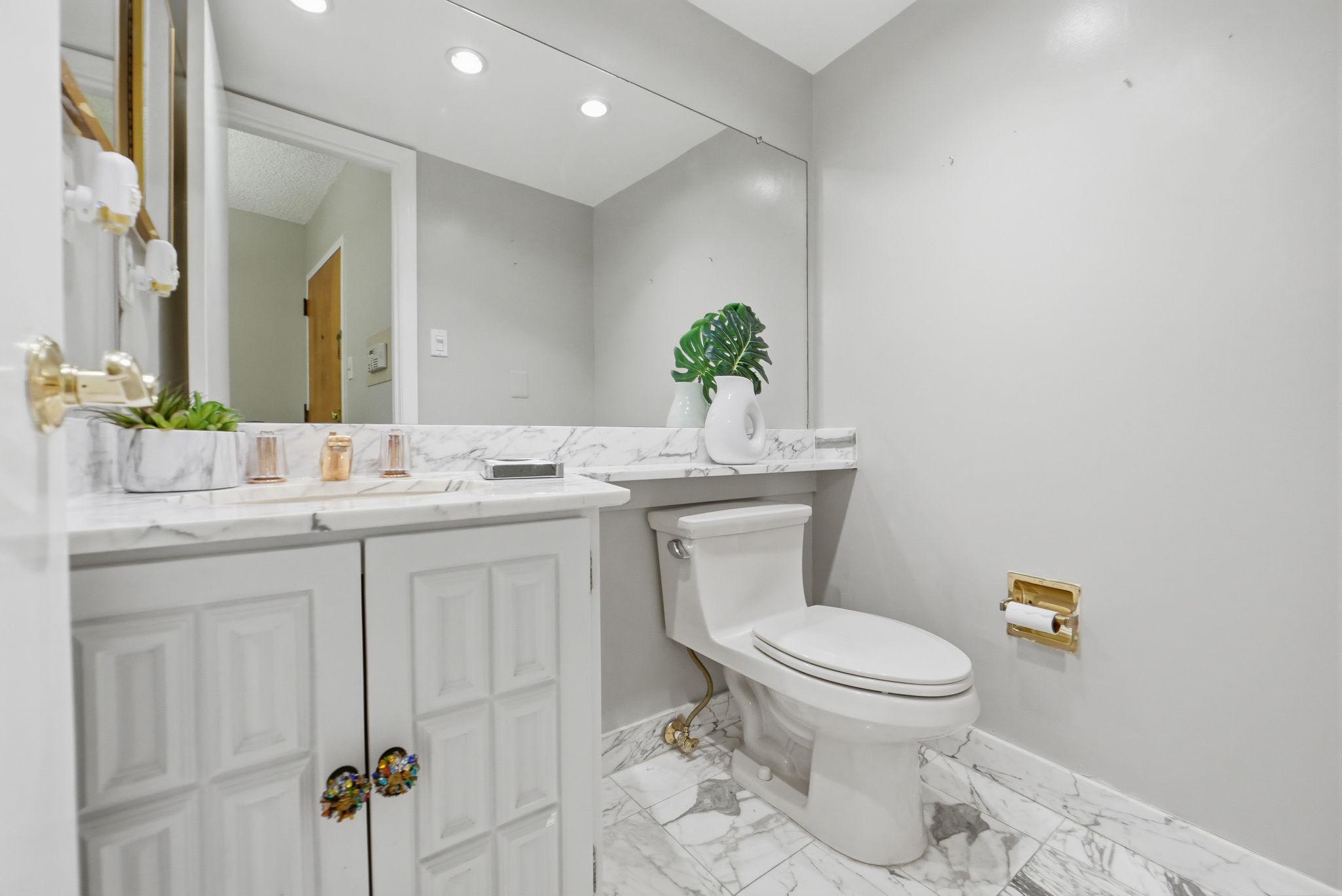 1101 South Arlington Ridge Road, Unit 305 Arlington, VA 22202 - Photo 9 of 41 Marble guest powder bathroom