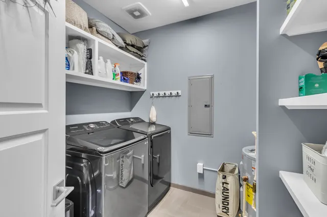 a utility room with dryer and washer