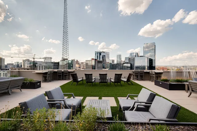 an aerial view of a house with swimming pool and outdoor space