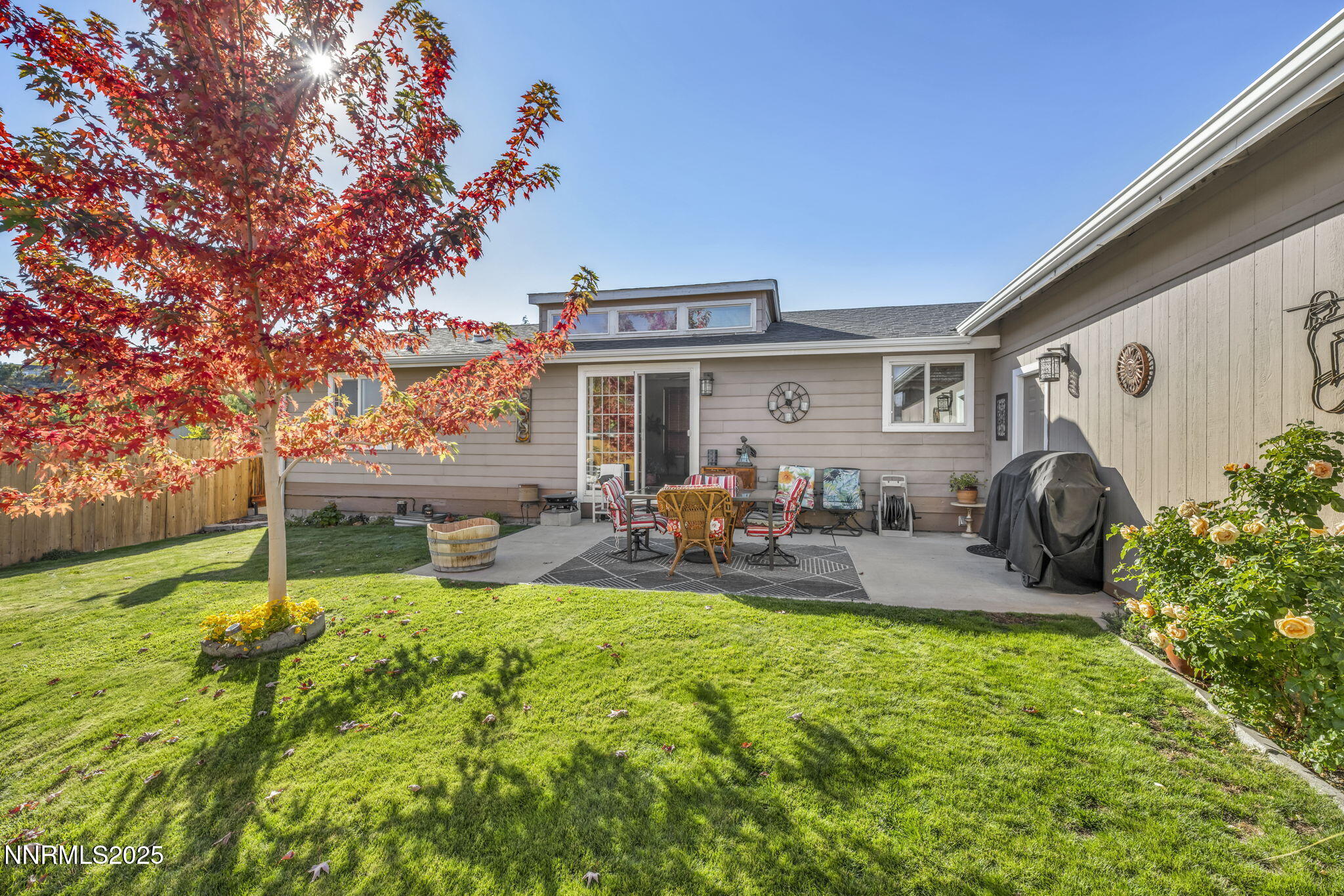 110 Platinum Pointe Way Reno, NV 89506 - Photo 12 of 39 a view of a house with backyard sitting area and garden