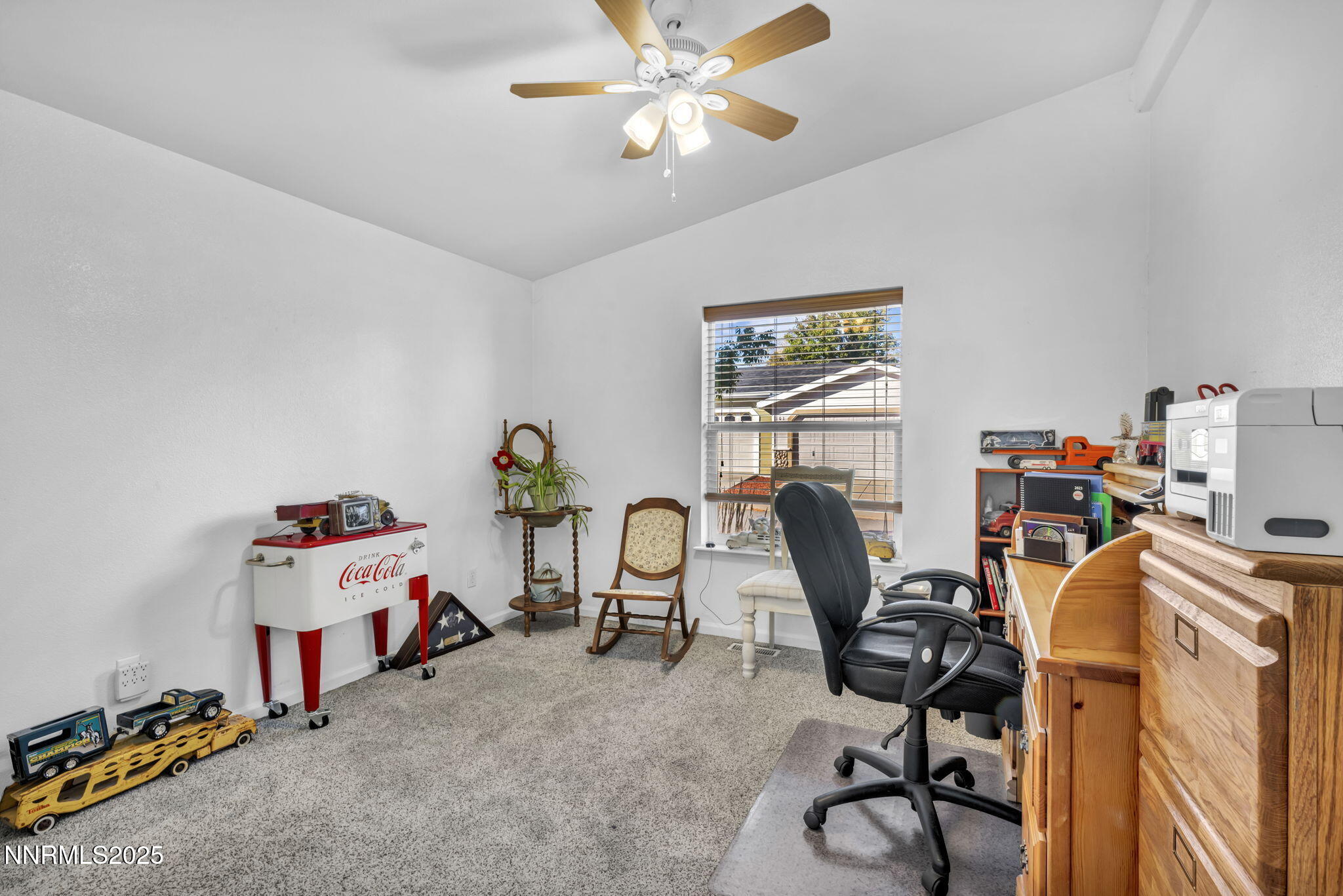 110 Platinum Pointe Way Reno, NV 89506 - Photo 18 of 39 a view of a workspace with furniture and a window