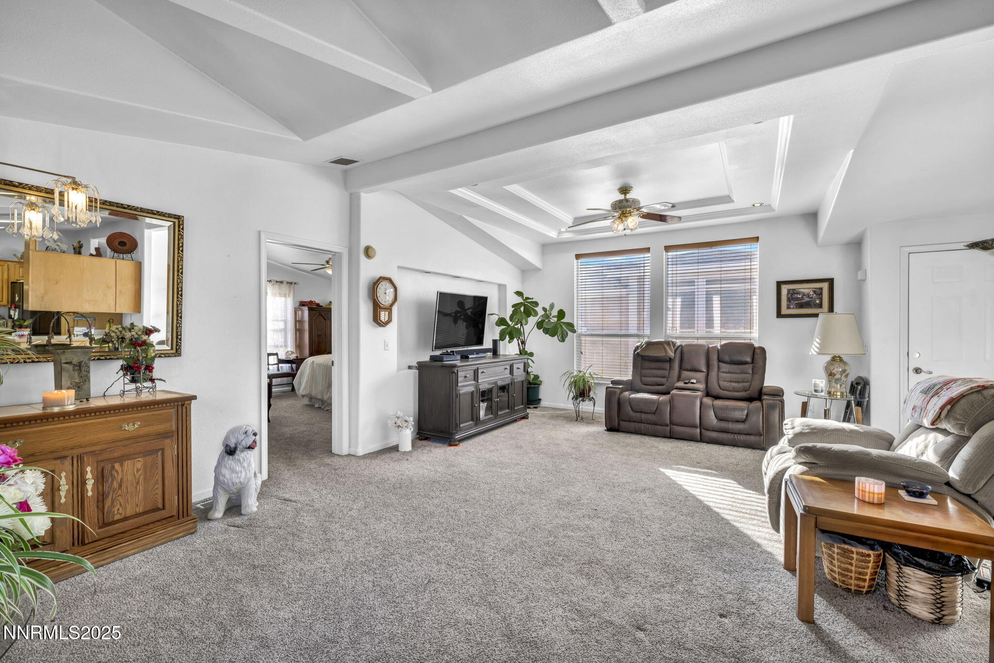 110 Platinum Pointe Way Reno, NV 89506 - Photo 31 of 39 a living room with furniture and a flat screen tv
