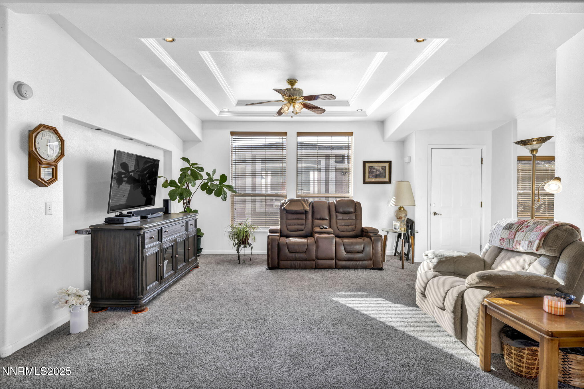 110 Platinum Pointe Way Reno, NV 89506 - Photo 36 of 39 a living room with furniture and a flat screen tv