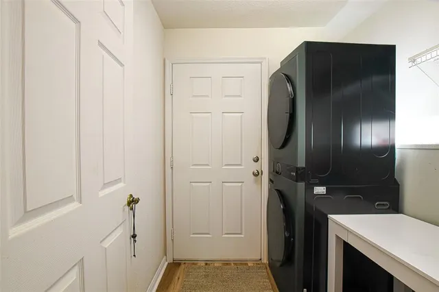 a bedroom with a bed and a fireplace