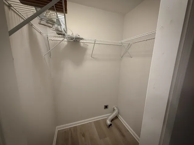 a view of a room with racks on the wall