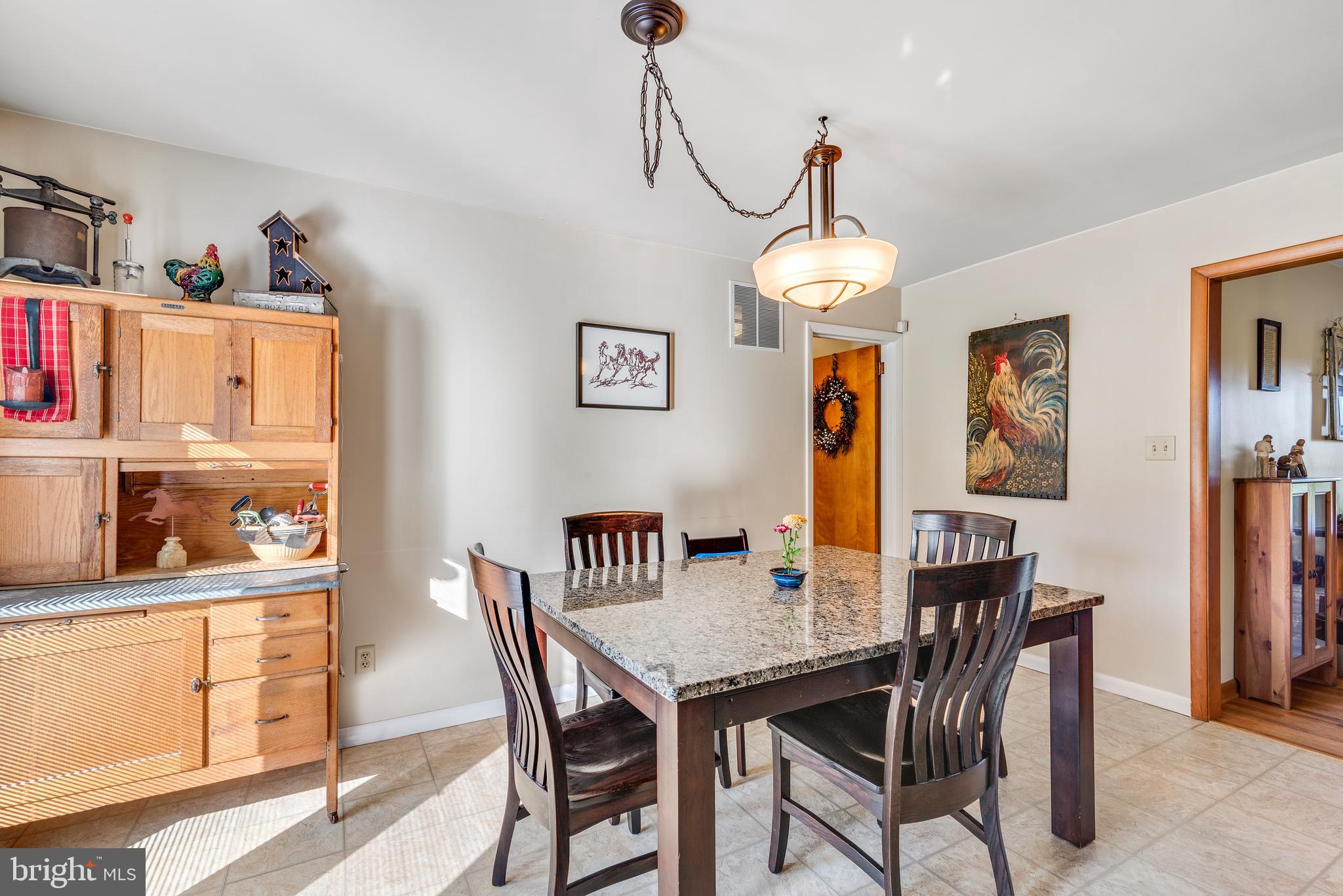 913 Quarry Road Perkasie, PA 18944 - Photo 11 of 35 Dining area off kitchen with sliders to patio