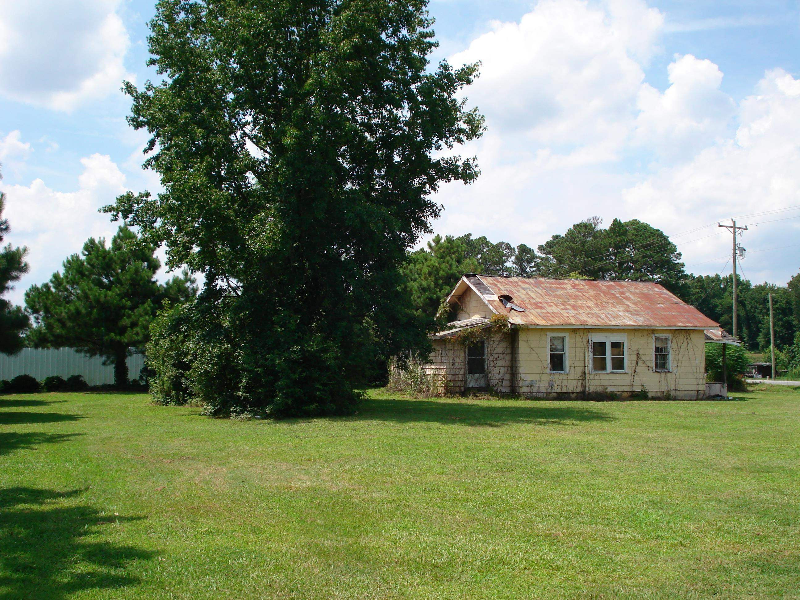 528 Long Branch Road Dunn, NC 28334 - Photo 18 of 27 a view of house with garden