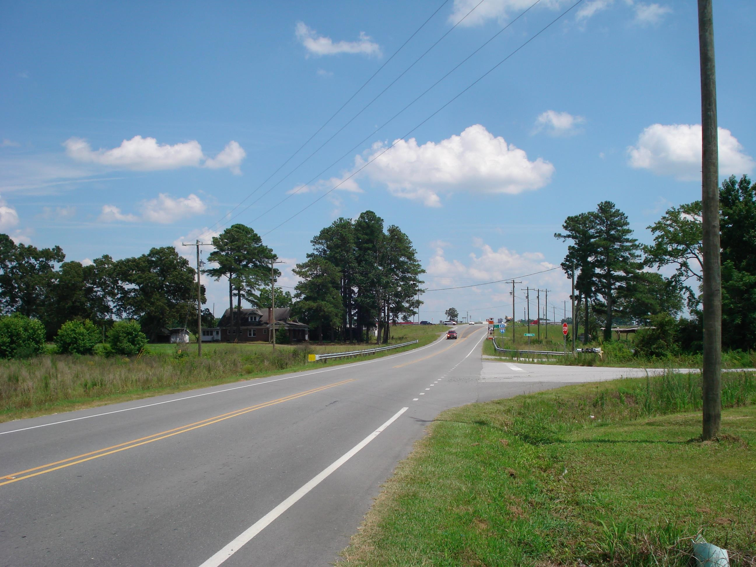 528 Long Branch Road Dunn, NC 28334 - Photo 10 of 27 a view of a golf course with a lake