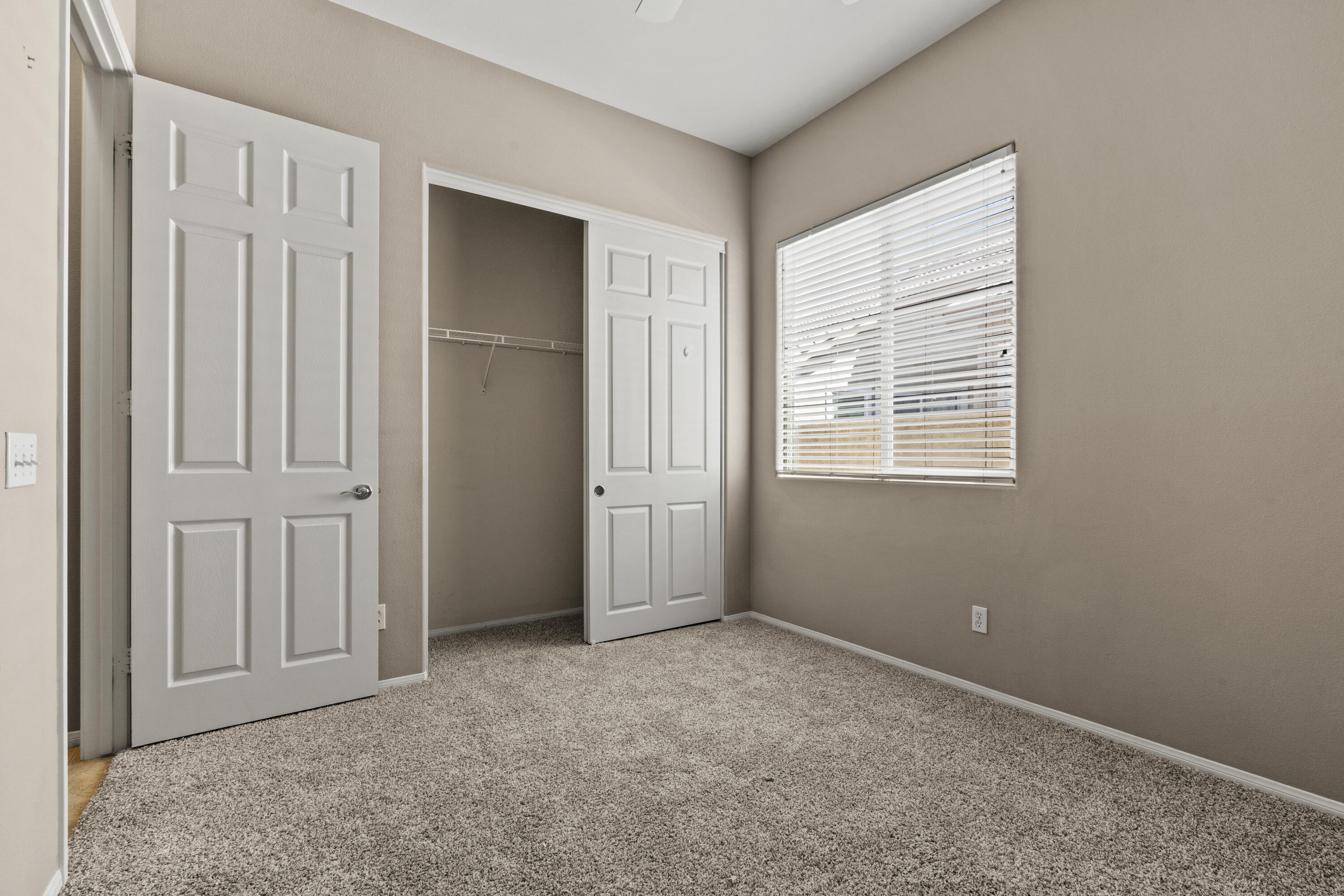 49418 Wayne Street Indio, CA 92201 - Photo 19 of 29 an empty room with windows