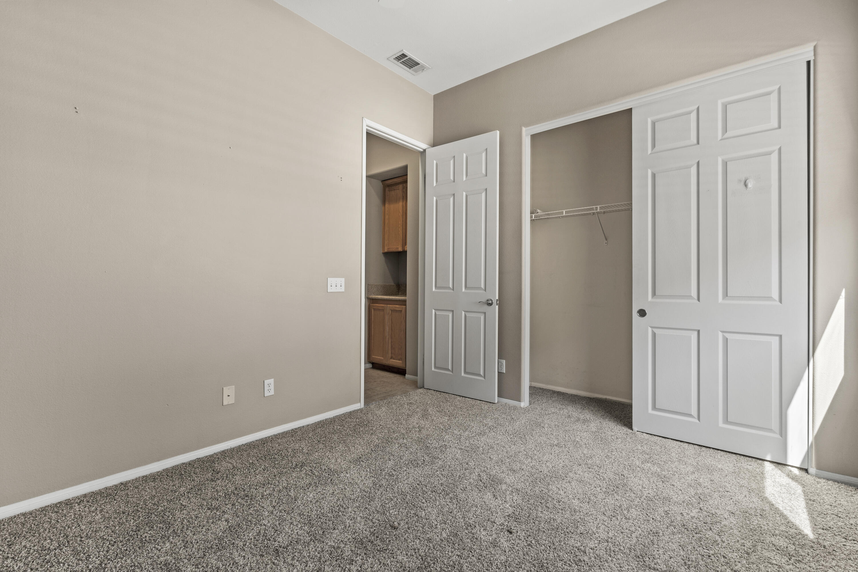 49418 Wayne Street Indio, CA 92201 - Photo 20 of 29 an empty room with closet area