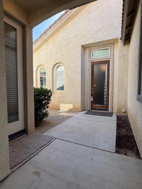 49418 Wayne Street Indio, CA 92201 - Photo 2 of 29 a view of a house with entryway doors