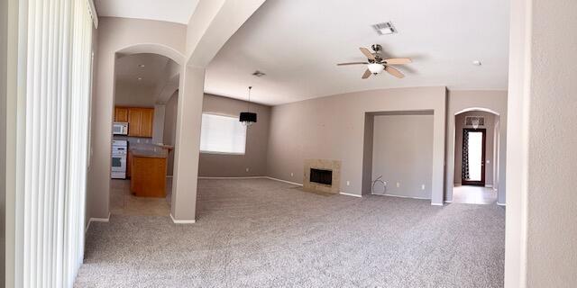 49418 Wayne Street Indio, CA 92201 - Photo 24 of 29 a view of a livingroom with a chandelier fan and windows