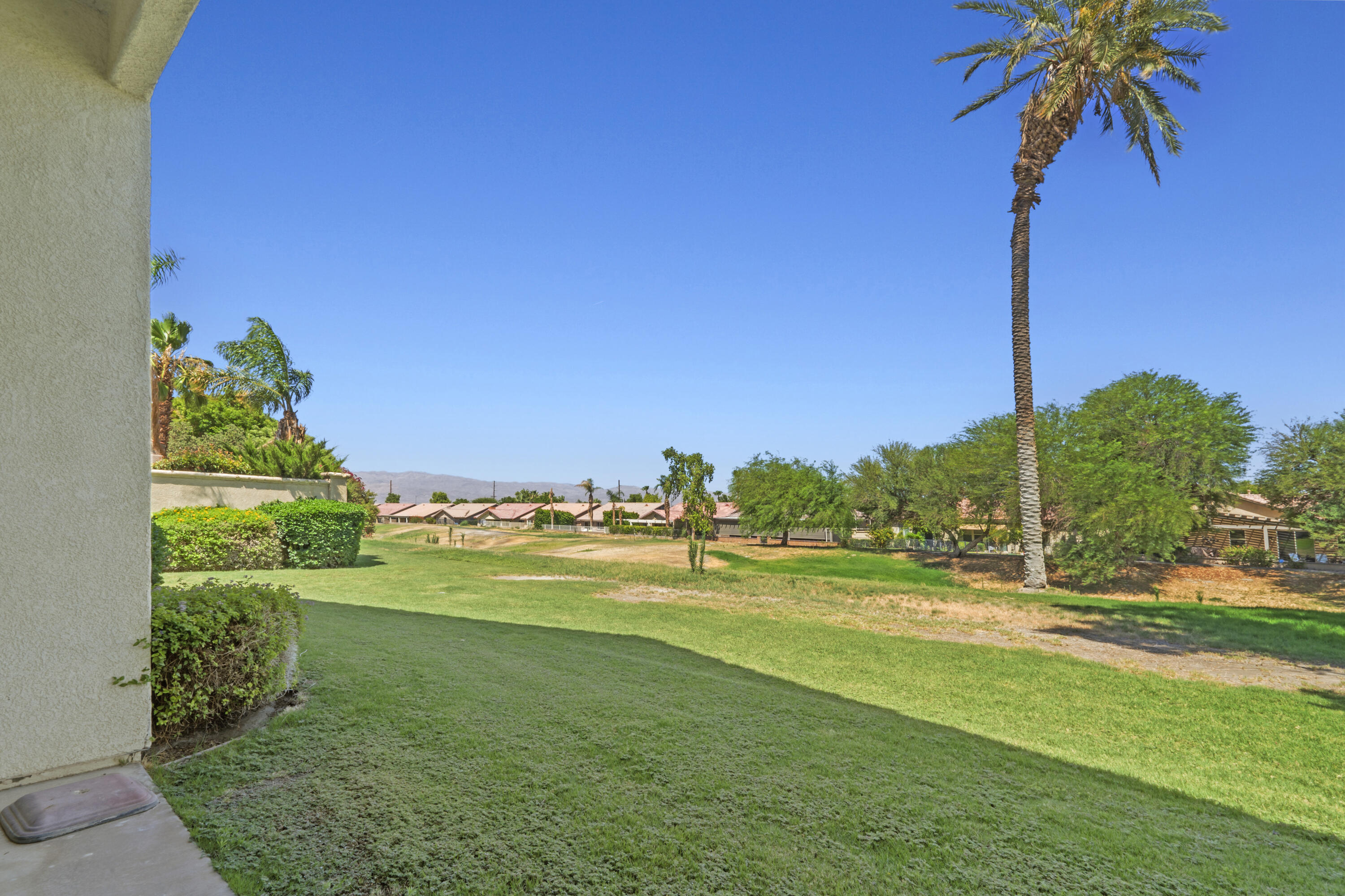 49418 Wayne Street Indio, CA 92201 - Photo 27 of 29 a view of a golf club with a big yard