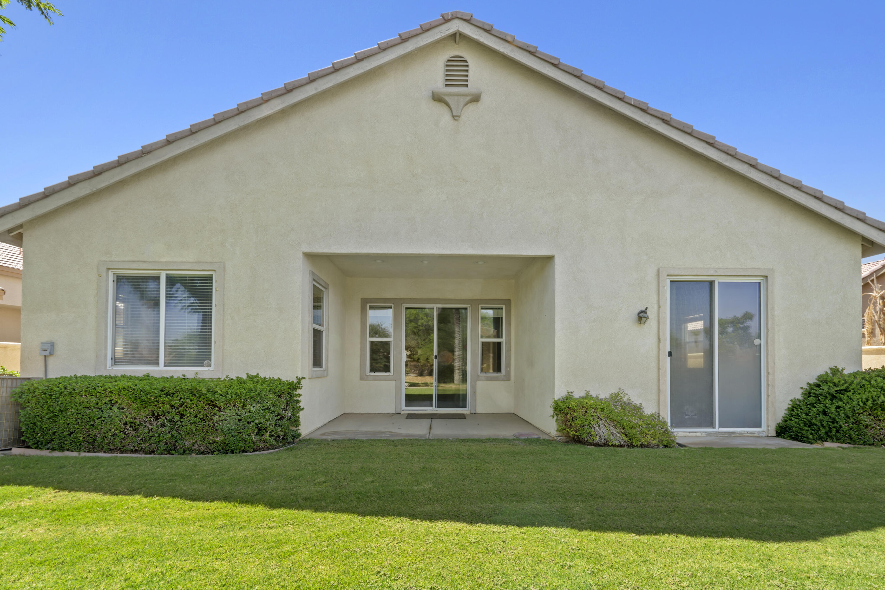 49418 Wayne Street Indio, CA 92201 - Photo 28 of 29 a front view of a house with a yard
