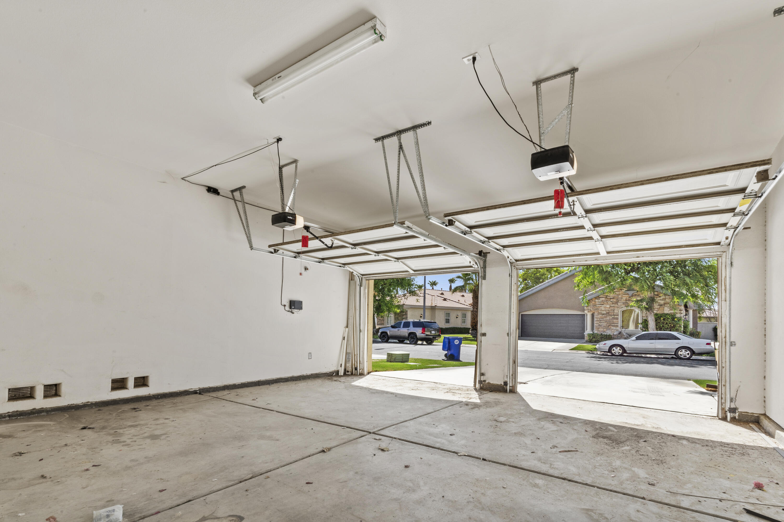 49418 Wayne Street Indio, CA 92201 - Photo 29 of 29 a utility room with lots of windows and white walls