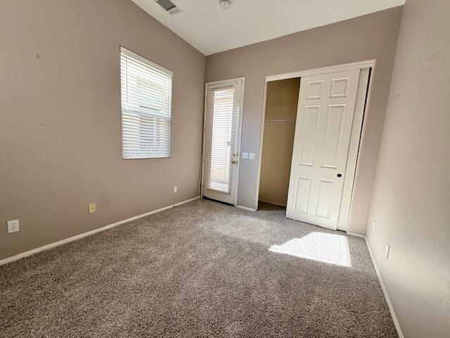 49418 Wayne Street Indio, CA 92201 - Photo 4 of 29 an empty room with windows