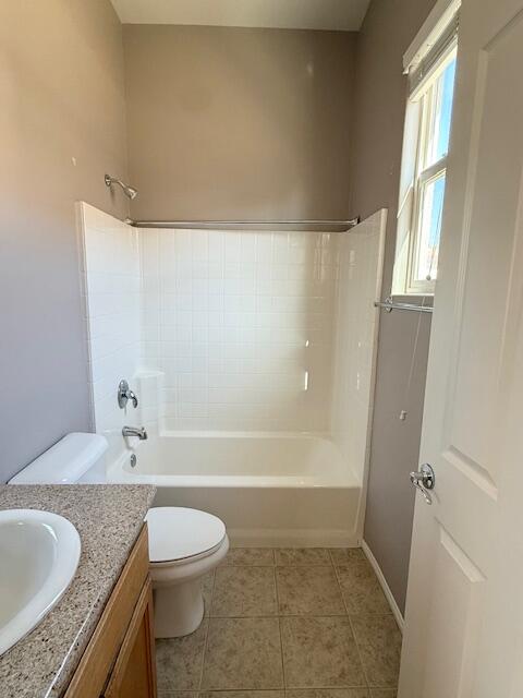 49418 Wayne Street Indio, CA 92201 - Photo 5 of 29 a bathroom with a granite countertop sink a toilet and tub