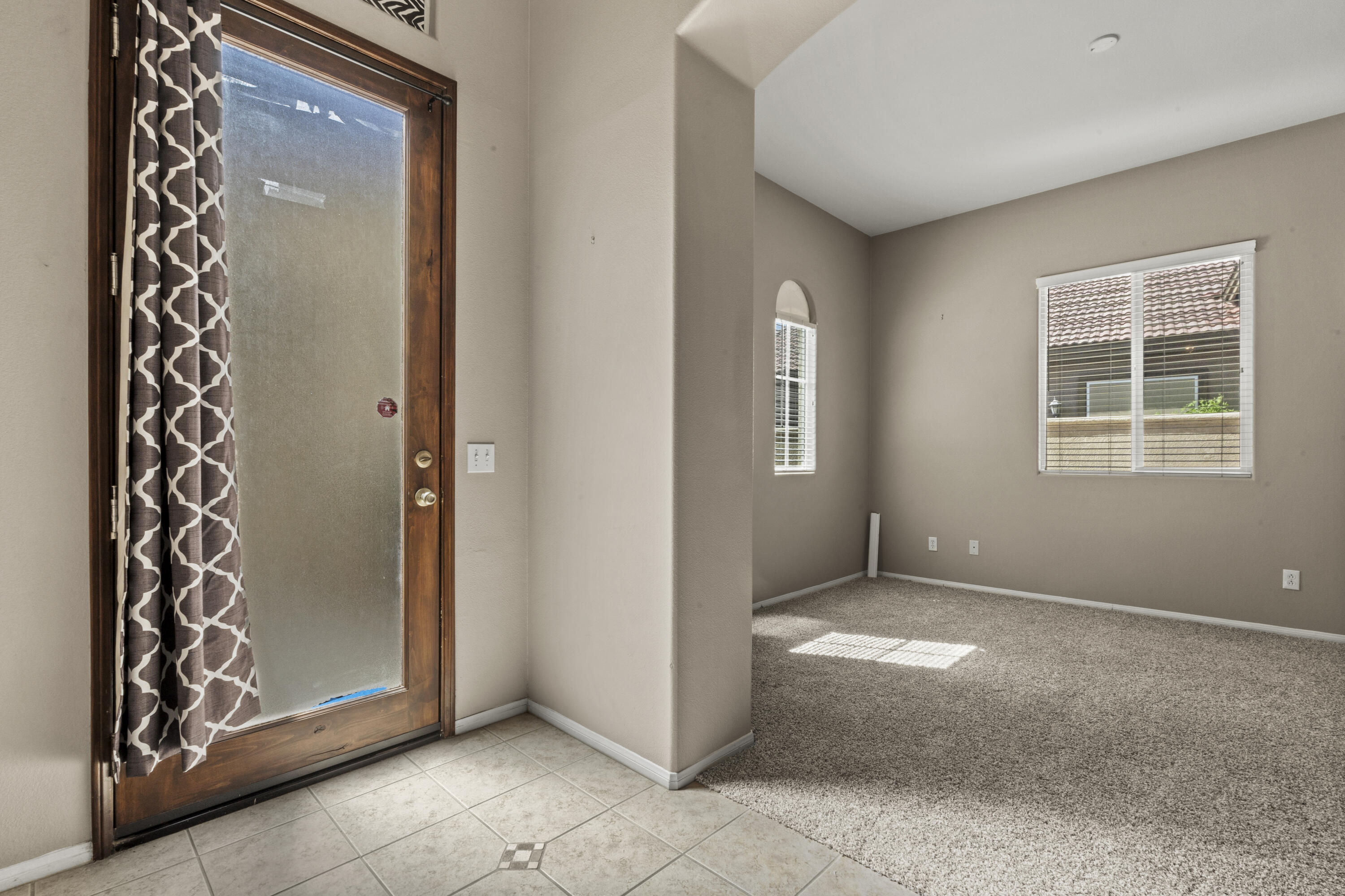 49418 Wayne Street Indio, CA 92201 - Photo 6 of 29 an empty room with windows