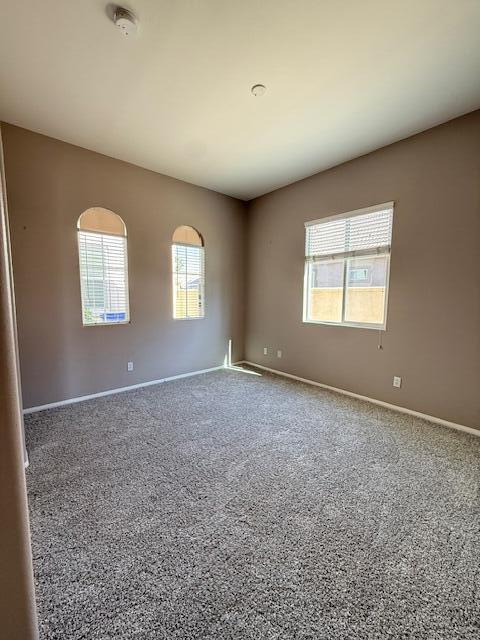 49418 Wayne Street Indio, CA 92201 - Photo 8 of 29 an empty room with windows