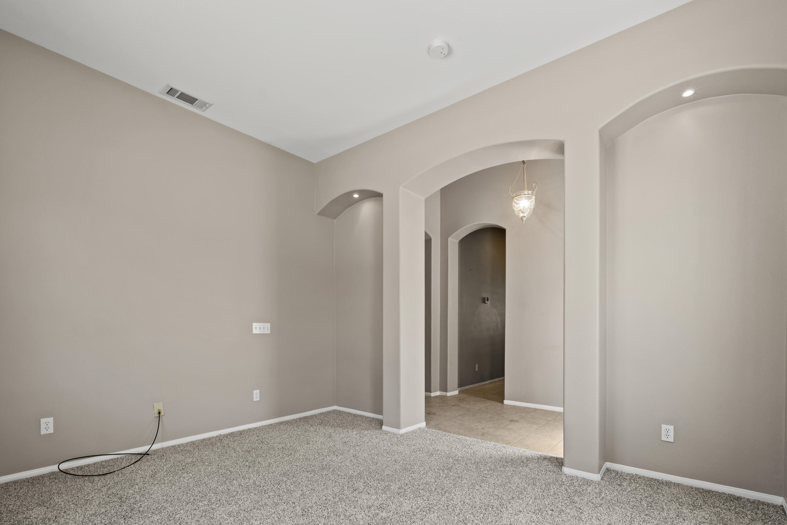 49418 Wayne Street Indio, CA 92201 - Photo 9 of 29 an empty room with closet and a window