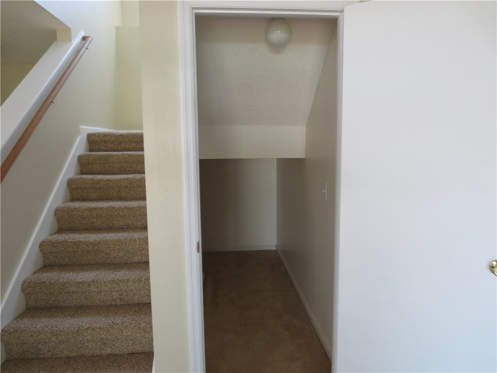 86063 Augustus Avenue Yulee, FL 32097 - Photo 13 of 20 a view of staircase with white walls