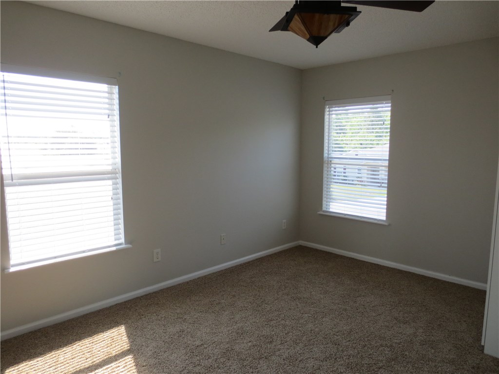 86063 Augustus Avenue Yulee, FL 32097 - Photo 14 of 20 an empty room with a window