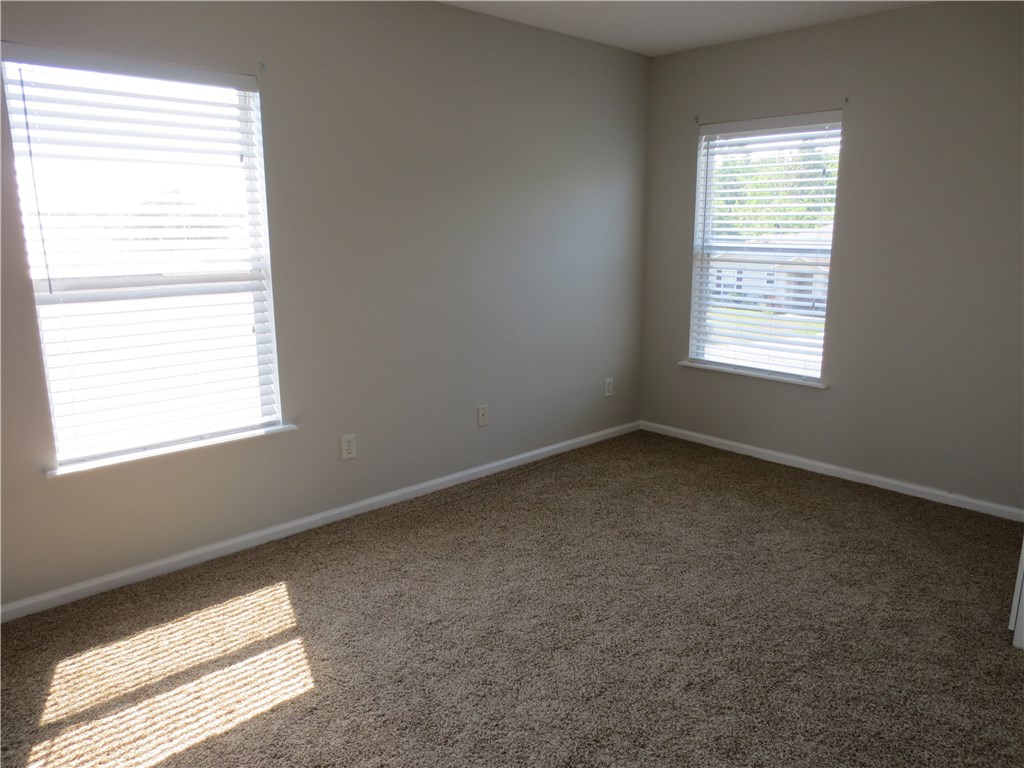 86063 Augustus Avenue Yulee, FL 32097 - Photo 15 of 20 an empty room with a window