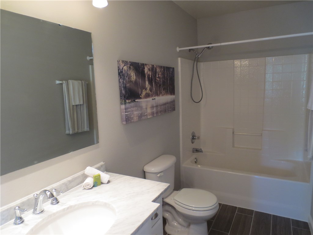 86063 Augustus Avenue Yulee, FL 32097 - Photo 17 of 20 a bathroom with a sink toilet and shower