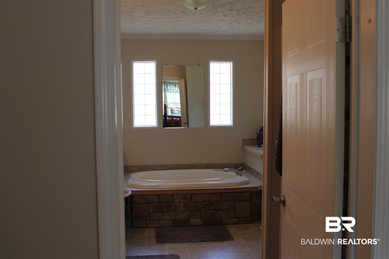 9380 Spice Pond Road Eight Mile, AL 36613 - Photo 31 of 36 Dual sinks and a separate shower.