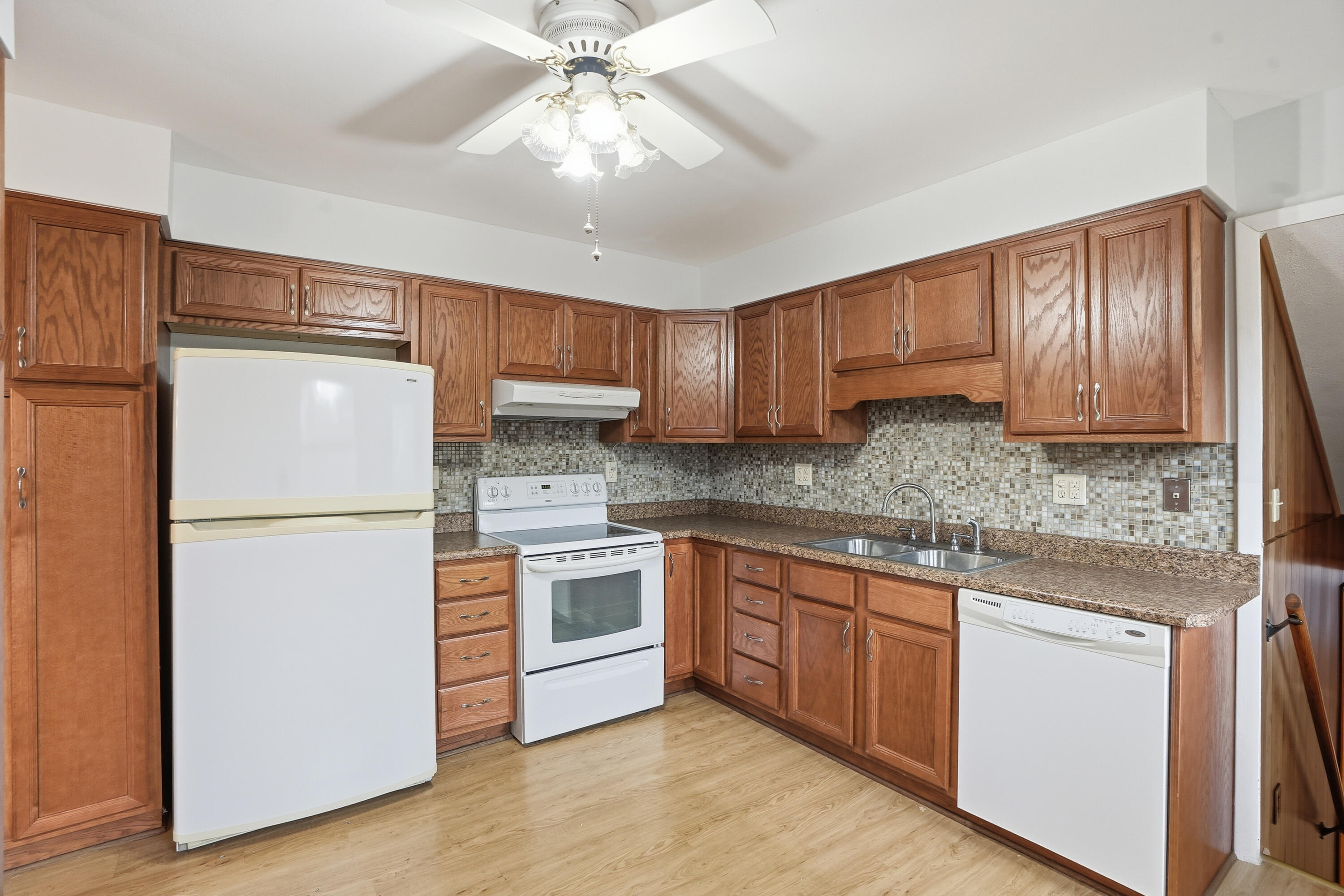 780 Williams Court Crown Point, IN 46307 - Photo 13 of 33 a kitchen with stainless steel appliances granite countertop a refrigerator a sink dishwasher a stove top oven a refrigerator with island and cabinets