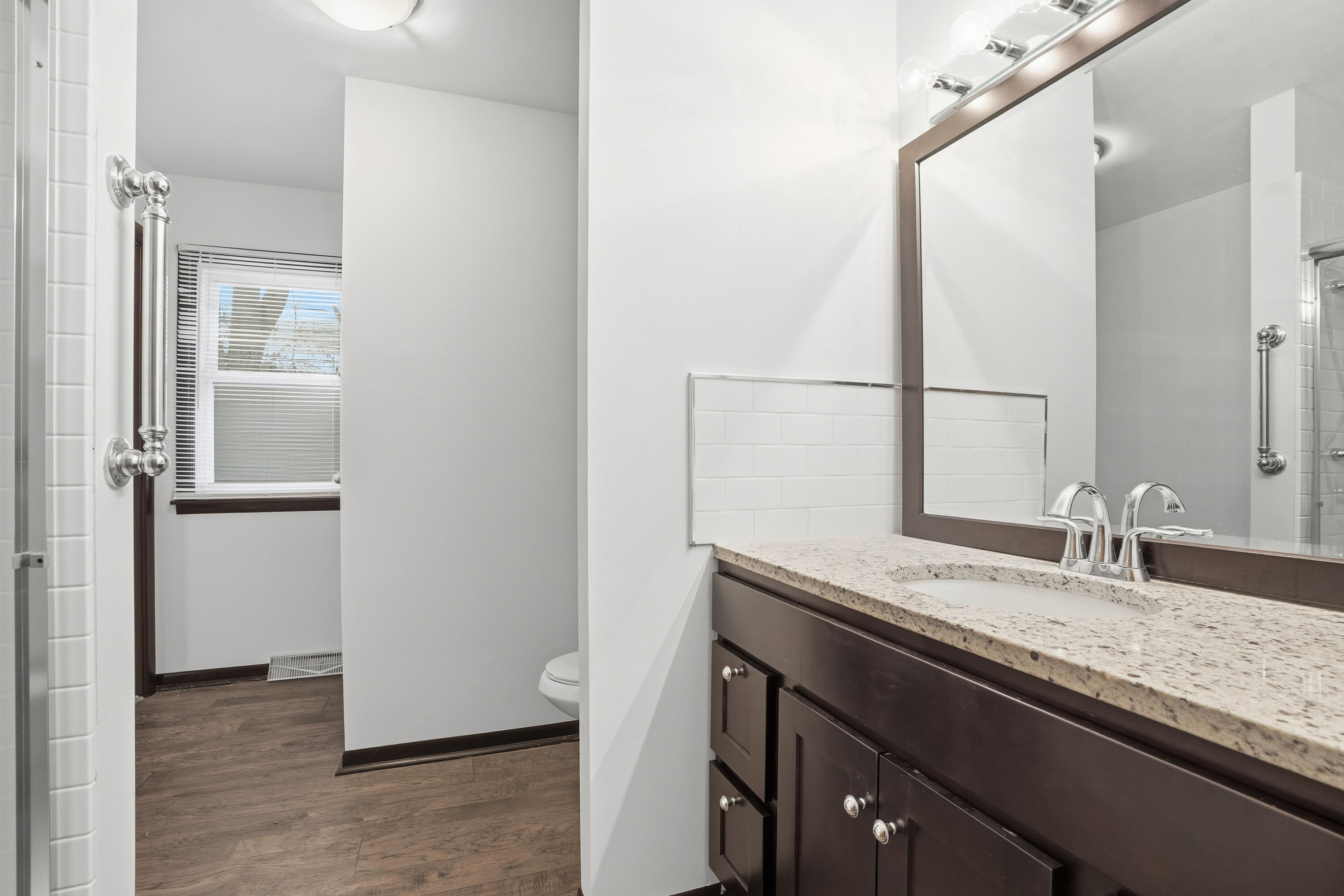 780 Williams Court Crown Point, IN 46307 - Photo 19 of 33 a bathroom with a sink and a mirror