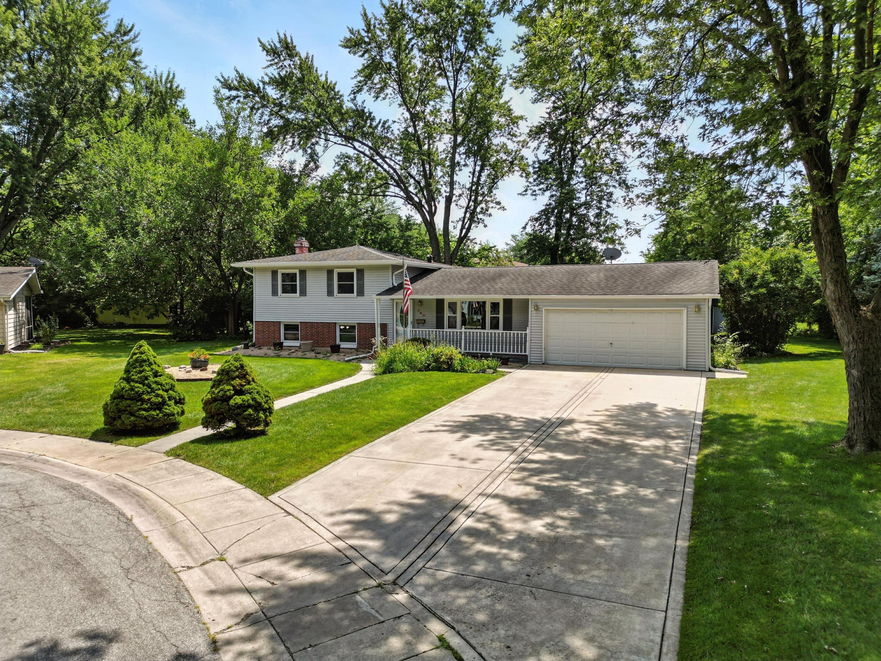 780 Williams Court Crown Point, IN 46307 - Photo 3 of 33 a front view of a house with a yard